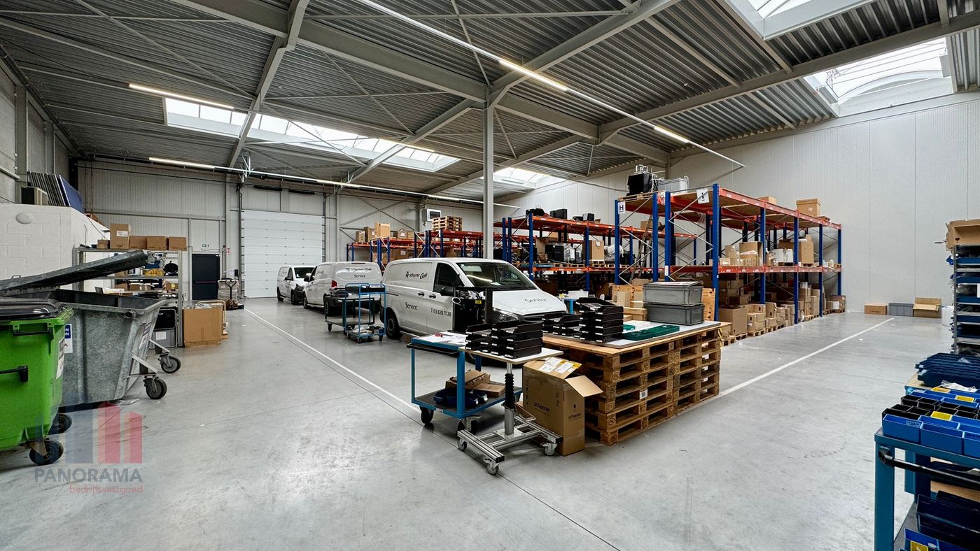 Workshop area with lift and training vehicles